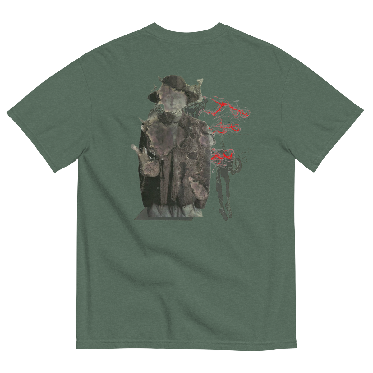 A sage green short-sleeve t-shirt shown from the back, featuring a large graphic print of a hooded figure in a dark coat with red smoke-like accents.