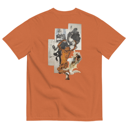 An orange crewneck t-shirt shown from the back, featuring a large abstract collage graphic in black, white, and orange tones printed on the center back.