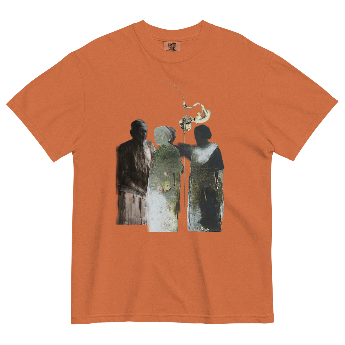 An orange crewneck t-shirt featuring a central graphic print of three stylized figures in muted green, gray, and black tones, with a small white bird above them.