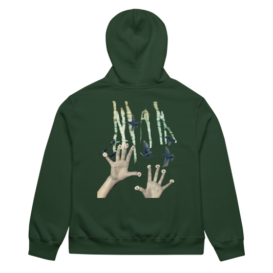 Green hoodie with artistic designs on the back against a white background
