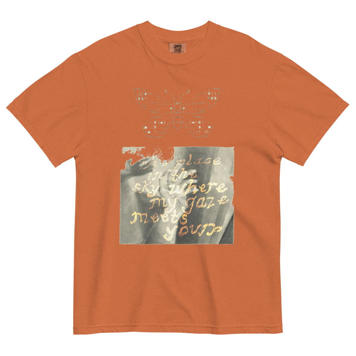 Orange t-shirt with butterfly design and text on a white background