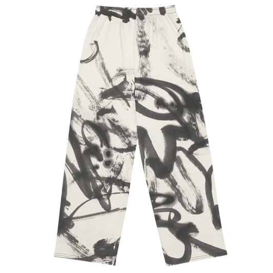Trousers with black abstract brushstroke pattern on a white background