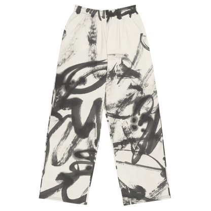 White pants with black abstract brushstroke pattern on a white background