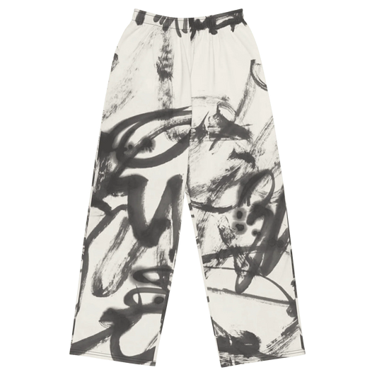 White pants with black abstract brushstroke pattern on a white background