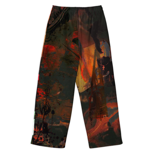 A pair of wide-leg pants featuring an abstract, painterly graphic print in dark green, black, red, orange, and brown tones, displayed flat against a solid white background.