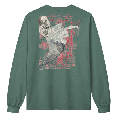 A long-sleeve crewneck t-shirt in a muted sage green, shown from the back. The back features a large graphic print of a stylized bird in gray and white, overlaid with distressed red text and abstract red splatters.