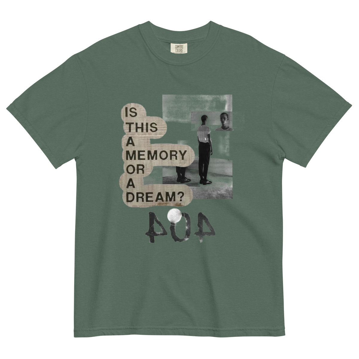 A sage green crewneck t-shirt with a graphic print on the front. The print features a black and white photo of a person in a room next to text bubbles reading 'IS THIS A MEMORY OR A DREAM?' and the word '404' in a distressed font.