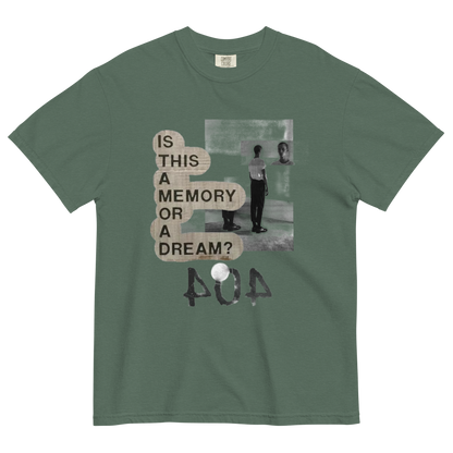 A sage green crewneck t-shirt with a graphic print on the front. The print features a black and white photo of a person in a room next to text bubbles reading 'IS THIS A MEMORY OR A DREAM?' and the word '404' in a distressed font.