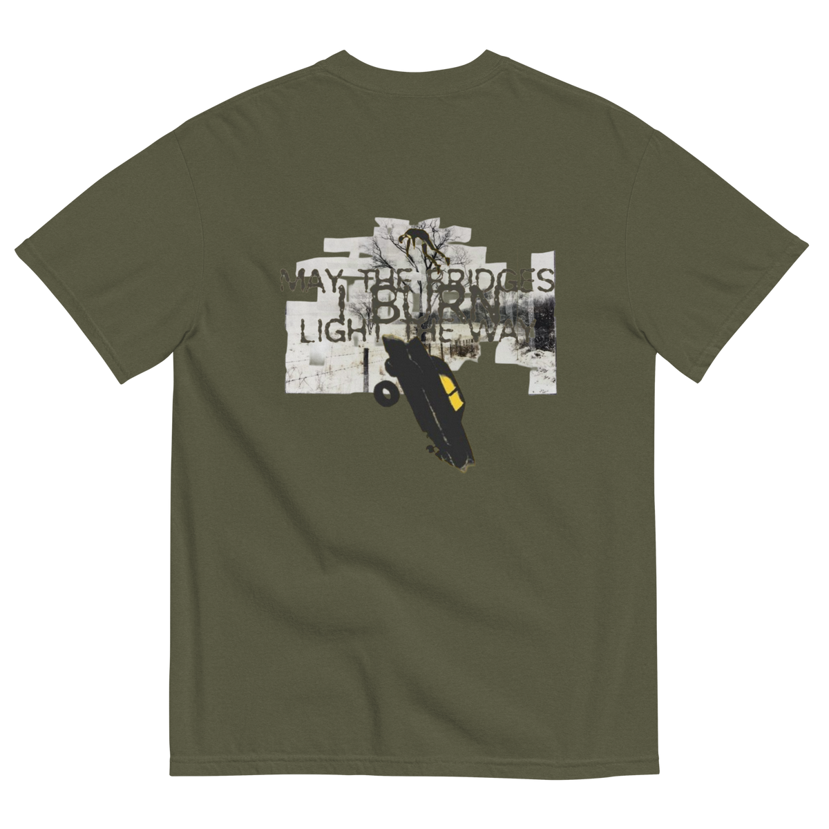 An olive green short-sleeve t-shirt shown from the back, featuring a large graphic print on the center. The graphic contains a collage of white and black elements, including a skateboarder and the text 'WAY THE BRIDGES ARE BURNING LIGHT THE WAY'.