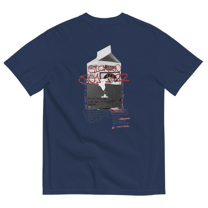 A navy blue short-sleeve t-shirt shown from the back, featuring a central graphic print of a milk carton filled with a black-and-white photo of a person, overlaid with red graffiti-style text reading 'ST. LOUIS 504 1972'.