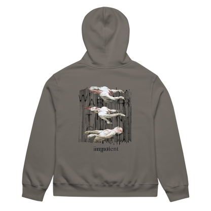 A gray-brown hoodie shown from the back, featuring a graphic print of four white pelicans flying vertically in front of a black textured background, with the word 'impatient' printed below.