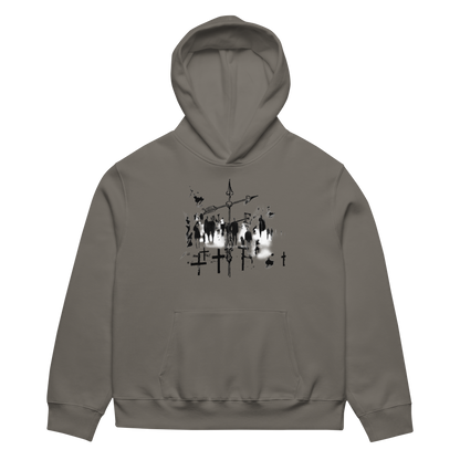 A dark gray pullover hoodie with a black and white graphic print of a graveyard scene on the chest, displayed against a solid white background.
