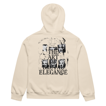 A beige hoodie shown from the back, featuring a large black graphic print with the text 'THE ART OF BRUTAL ELEGANCE' and collage-style imagery.