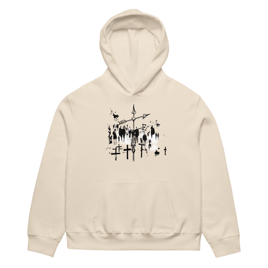 A cream-colored pullover hoodie with a black graphic print of a cross and candles on the chest, displayed against a solid white background.