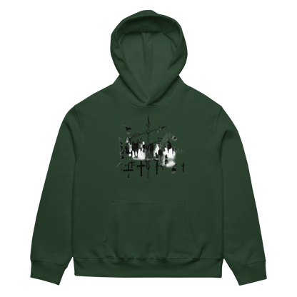 A dark forest green pullover hoodie with a black and white graphic print of a drum kit on the chest, displayed against a solid white background.