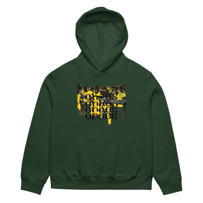 A dark green pullover hoodie with a front kangaroo pocket and a central graphic print featuring a yellow and black collage of people and the text 'CHOOSE BLACK POWER'.