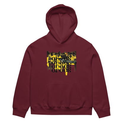 A maroon pullover hoodie with a front kangaroo pocket and a central graphic print featuring a yellow and black collage of people and the text 'CHICAGO CHICAGO ORDER'.